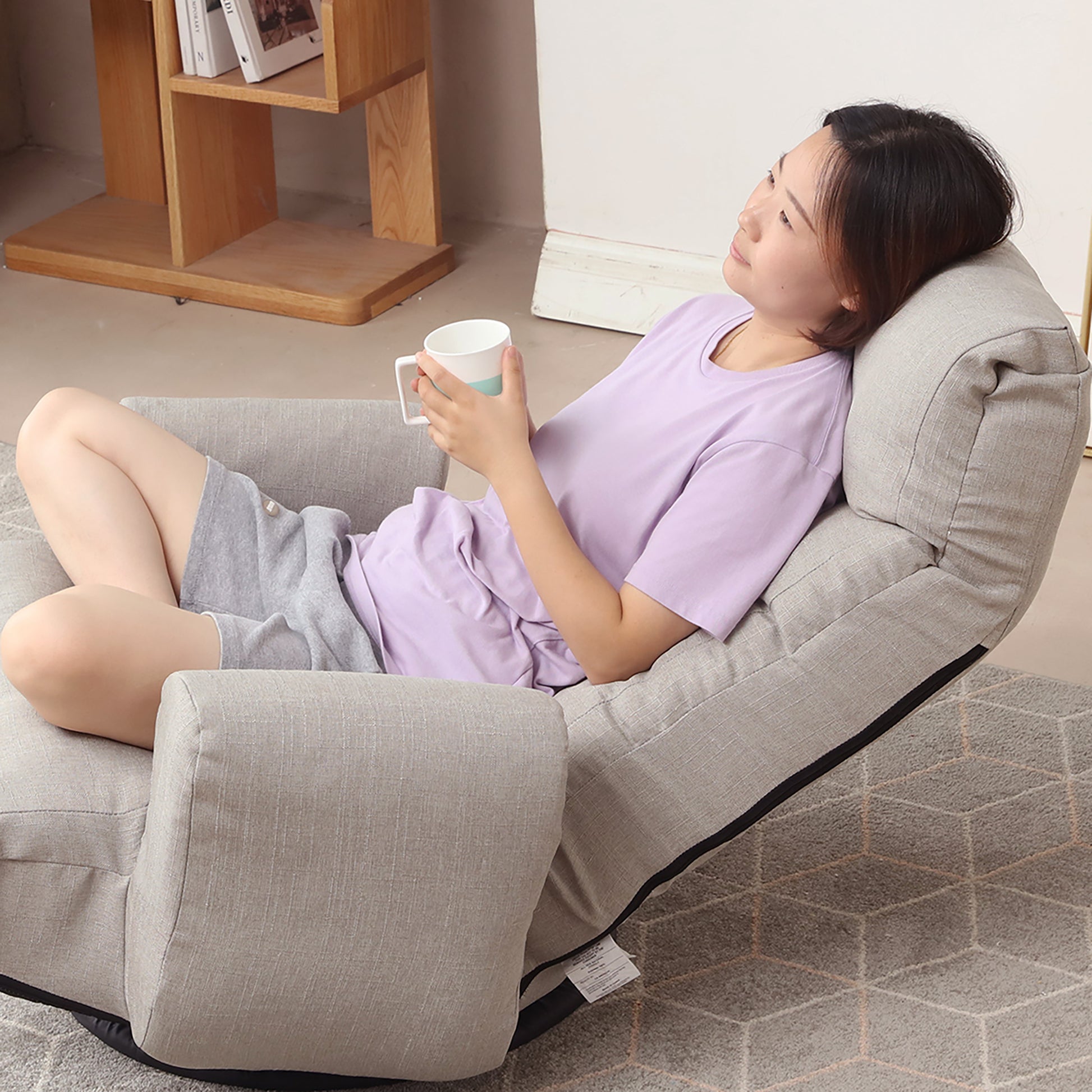 Swivel Indoor Recliner Floor Chair with Adjustable Headrest and Side Pockets- Gray